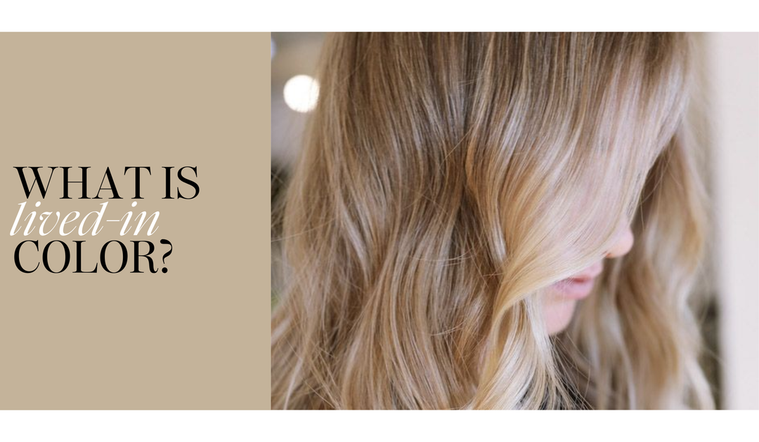 A promotional graphic with the text “What is lived-in color?” on a beige background beside a close-up of soft, dimensional blonde hair featuring natural, blended highlights and waves.