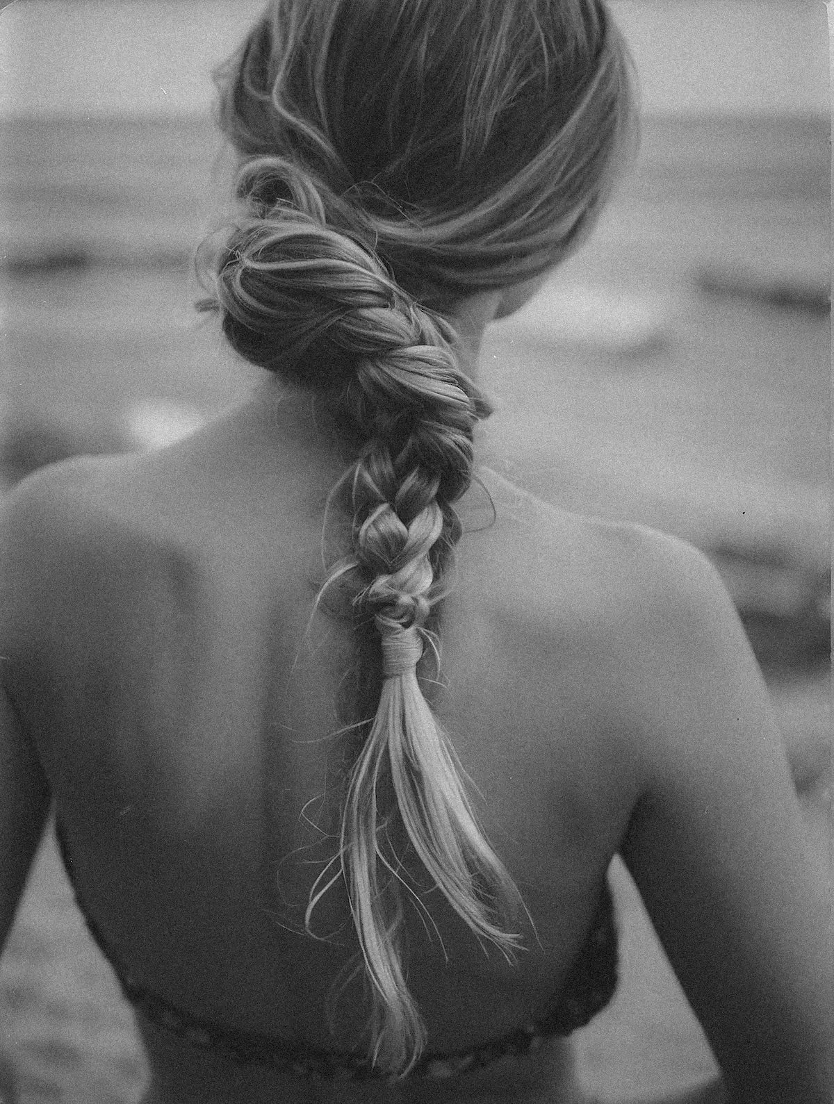 Intricate braided updo on long hair, styled at Jayden Presleigh, The Salon in Carlsbad, CA