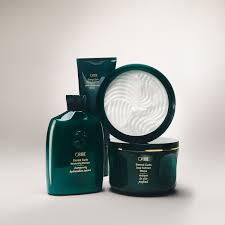 Eternal Curls Deep Treatment Mask set in teal packaging: jar, tube, and bottle with coconut- and almond-oil masque.